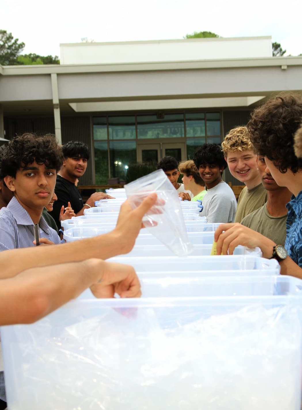 Hands of Hope volunteers in an assembly line