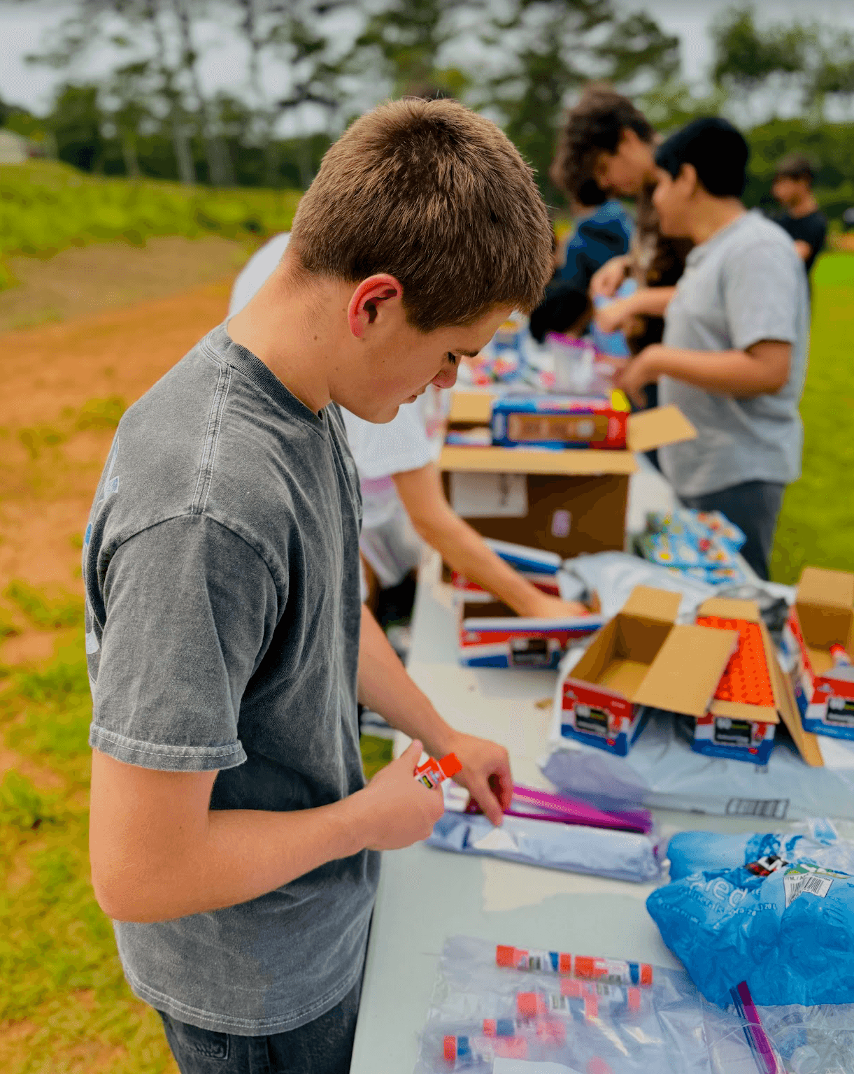 Portrait of a Hands of Hope student volunteer mid-shift
